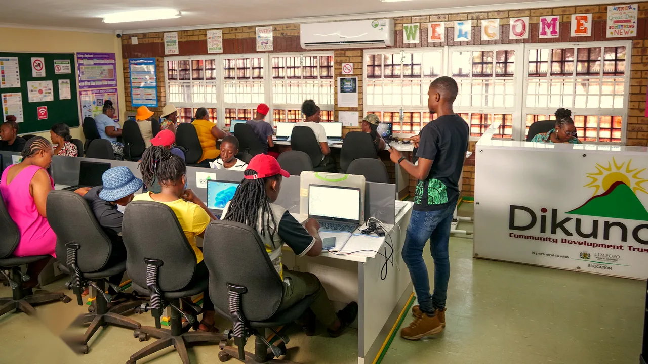Learners and community members working at laptops in the Northam ICT Centre