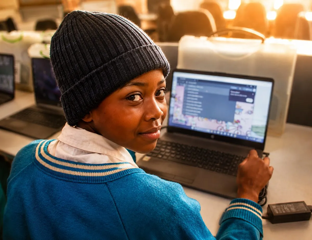 A young learner using a laptop at the Northam ICT Centre